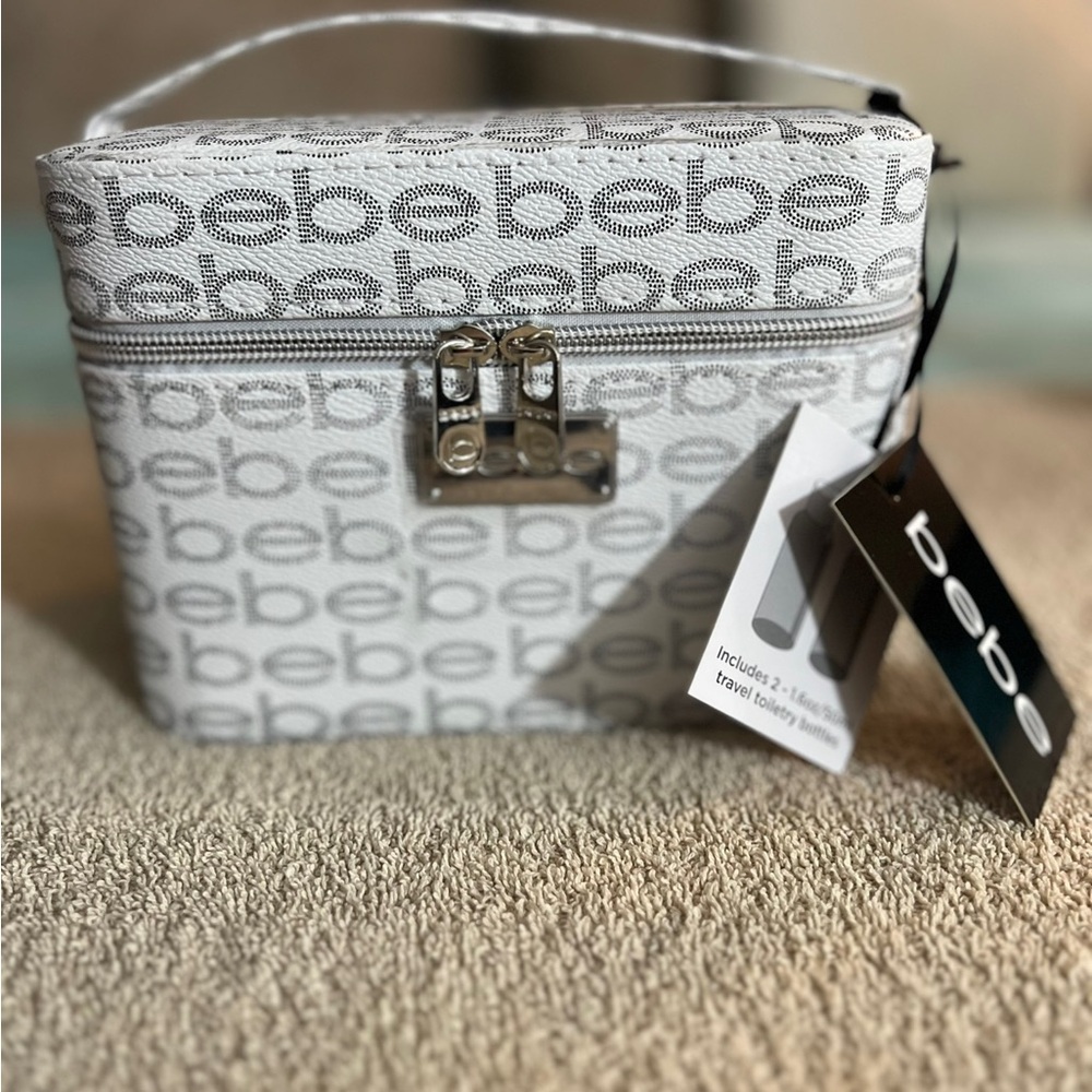 NWTs- Gorgeous Bebe Monogrammed Silver Cosmetic Bag : 2 Travel Bottles Inside 🩶
